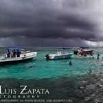 Tourist enjoying Hol Chan Marine Reserve in Ambergris Caye, Belize. © 2011 Jose Luis Zapata Photography. All Rights Reserved. Tourist enjoying Hol Chan Marine Reserve in Ambergris Caye, Belize. © 2011 Jose Luis Zapata Photography. All Rights Reserved.